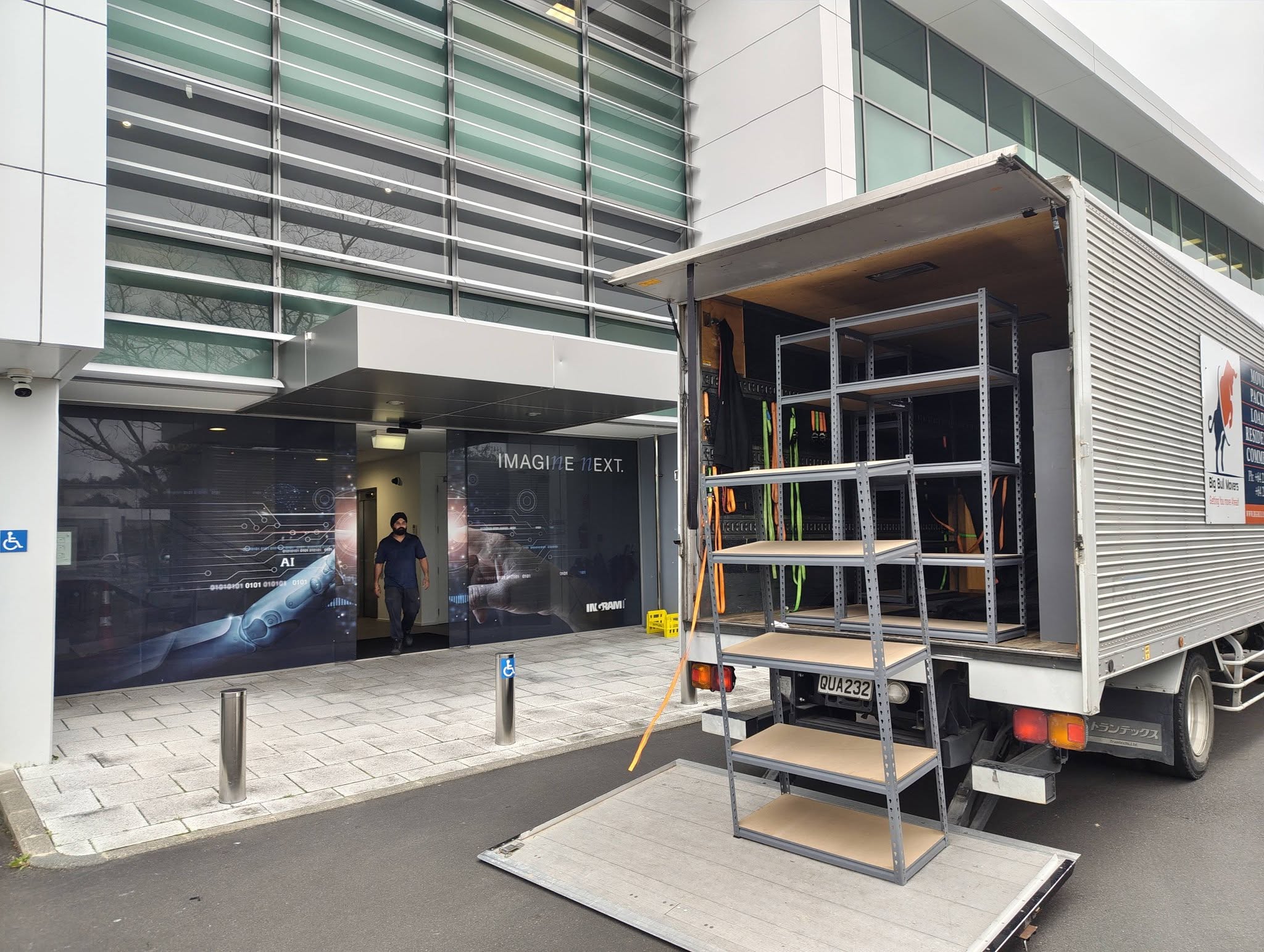 Big Bull Movers team loading office equipment during an office relocation in Auckland.
